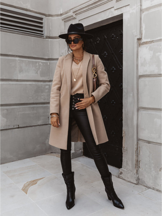 Single breasted long coat for women with notch lapel and flap pockets