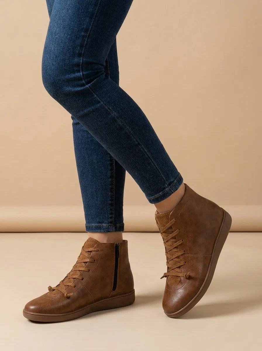 Chelsea boots for women with side zip and lace up front, flat sole