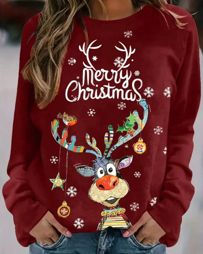 Womens christmas sweater with Merry Christmas slogan, reindeer print and ribbed hem