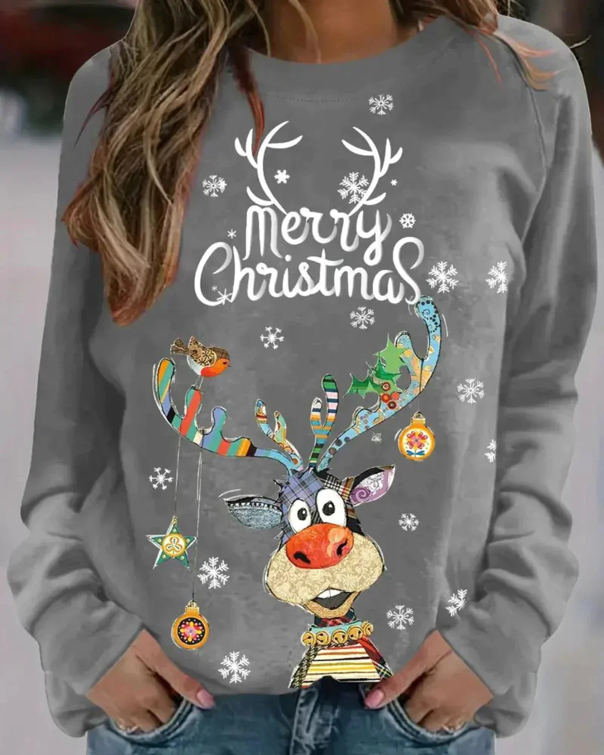 Womens christmas sweater with Merry Christmas slogan, reindeer print and ribbed hem