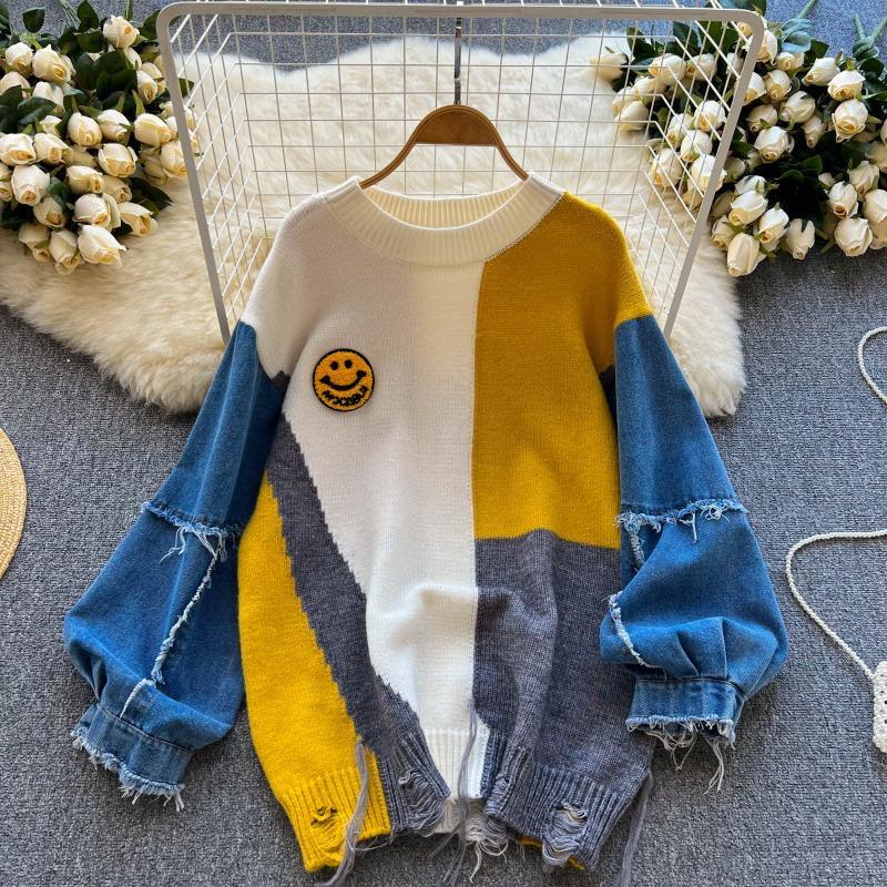 Women's sweaters with denim sleeves and a distressed hem