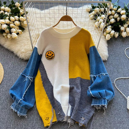 Women's sweaters with denim sleeves and a distressed hem