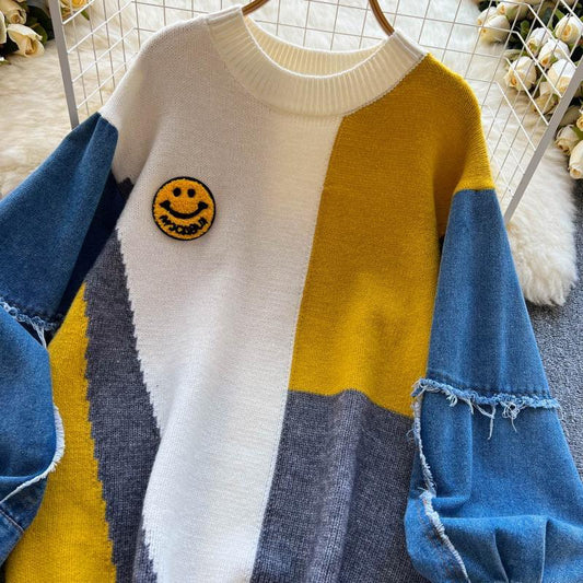 Women's sweaters with denim sleeves and a distressed hem