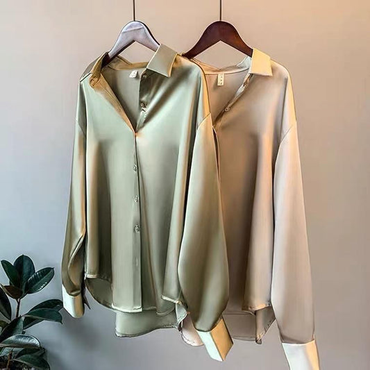 Oversized shirts for women with pointed collar, button down front and curved high low hem