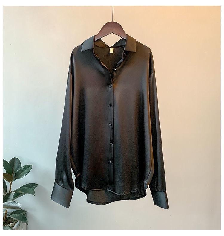 Oversized shirts for women with pointed collar, button down front and curved high low hem