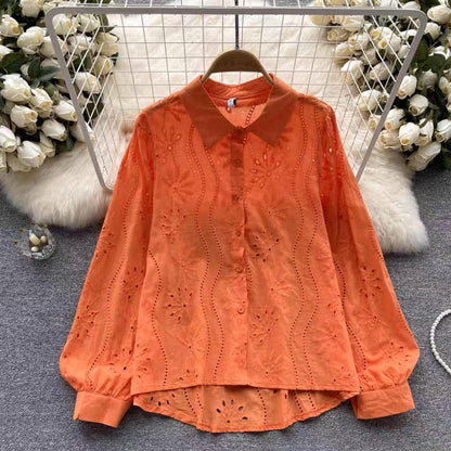 Eyelet shirts for women with button down front, relaxed fit and curved high low hem