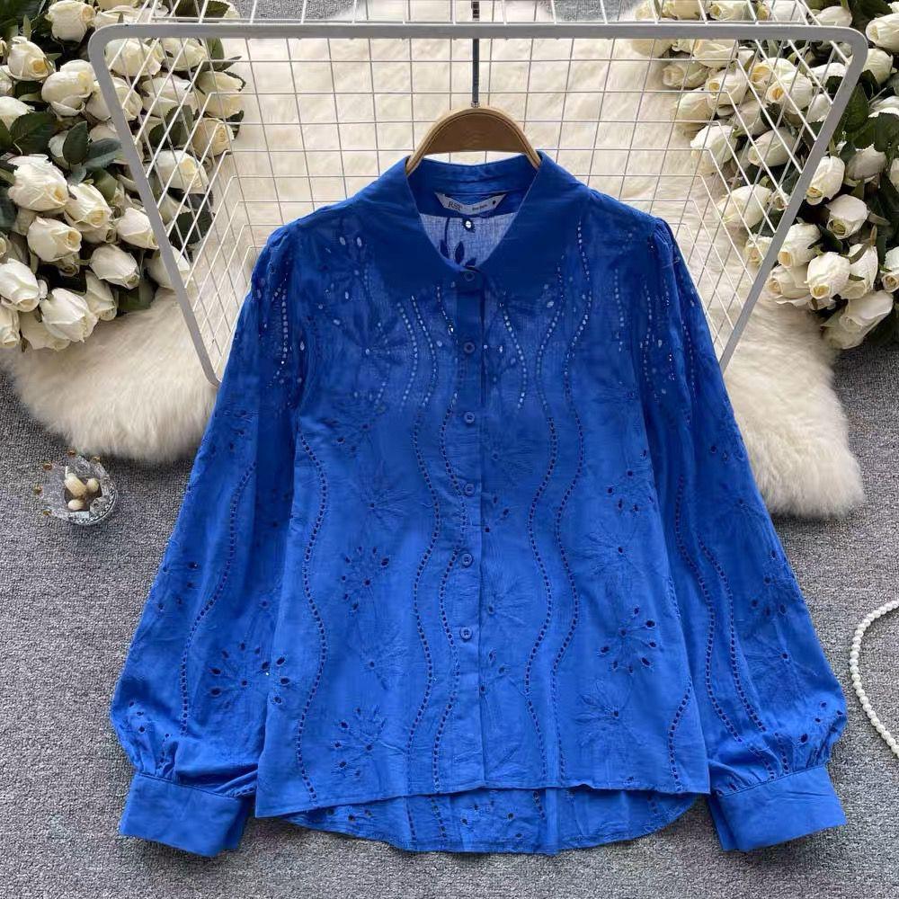 Eyelet shirts for women with button down front, relaxed fit and curved high low hem