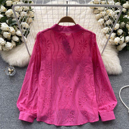 Eyelet shirts for women with button down front, relaxed fit and curved high low hem