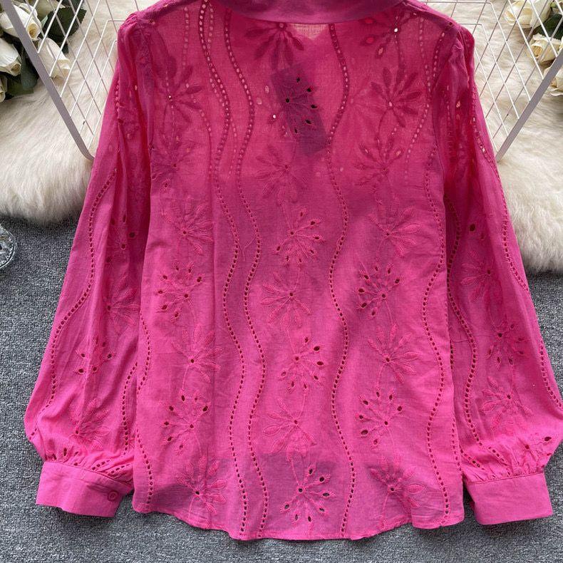 Eyelet shirts for women with button down front, relaxed fit and curved high low hem