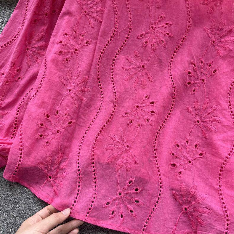 Eyelet shirts for women with button down front, relaxed fit and curved high low hem
