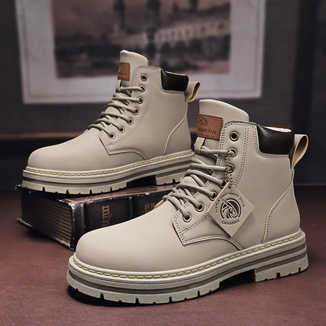 Men's boots with ankle high lace up front and chunky lug sole