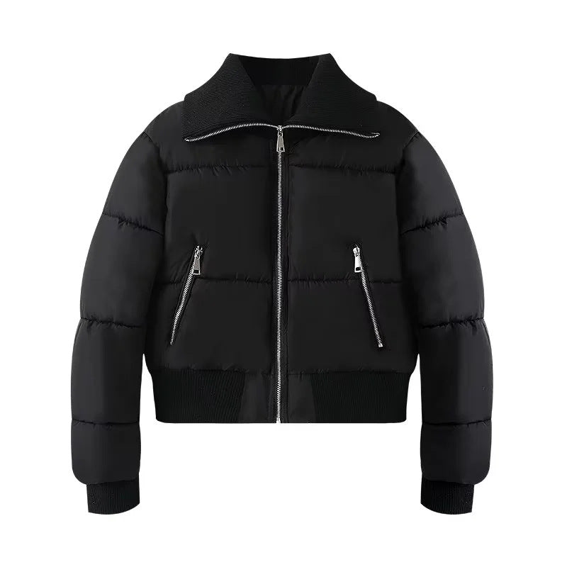 Womens puffer jacket with high collar, zip pockets and ribbed trims