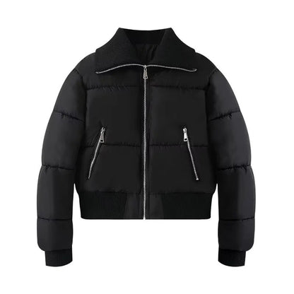 Womens puffer jacket with high collar, zip pockets and ribbed trims