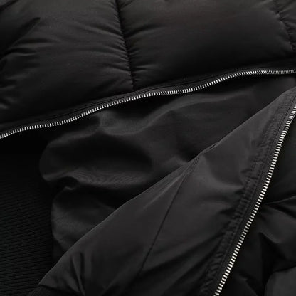 Womens puffer jacket with high collar, zip pockets and ribbed trims