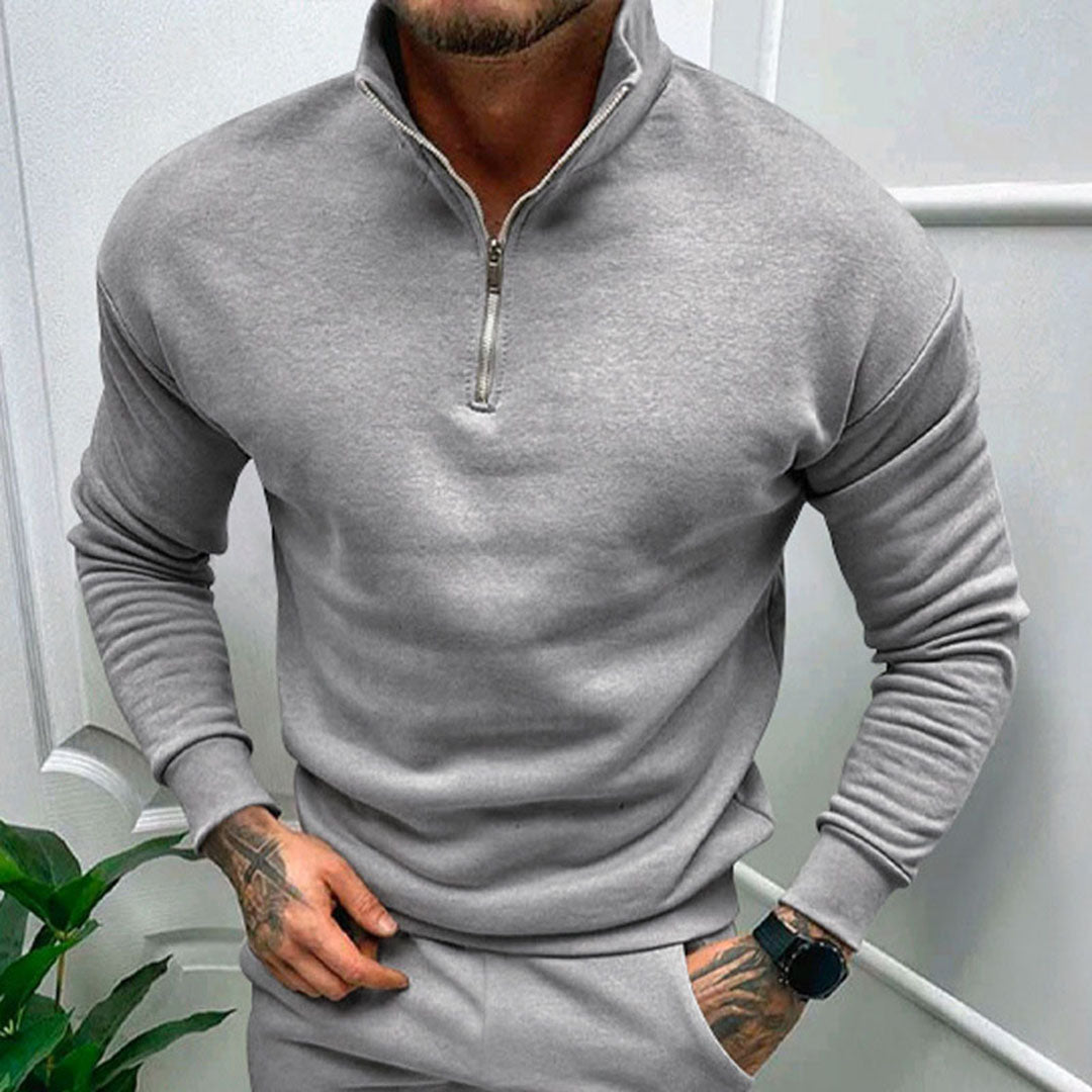 Quarter zip sweater for men with relaxed fit, drop shoulders and ribbed hem