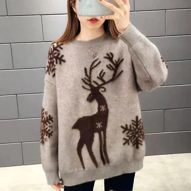 Womens christmas sweater with reindeer and snowflake design, oversized fit, ribbed cuffs
