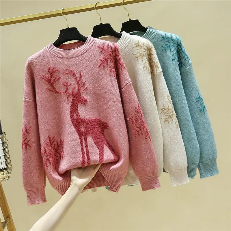 Womens christmas sweater with reindeer and snowflake design, oversized fit, ribbed cuffs