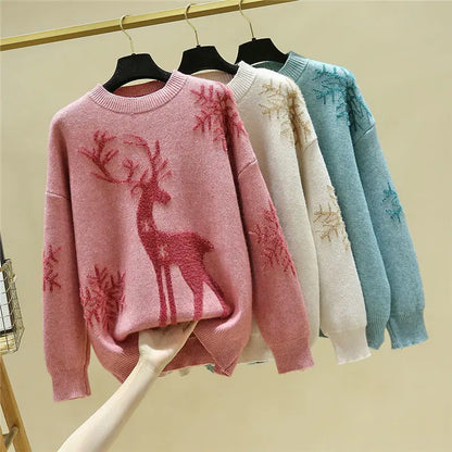 Womens christmas sweater with reindeer and snowflake design, oversized fit, ribbed cuffs