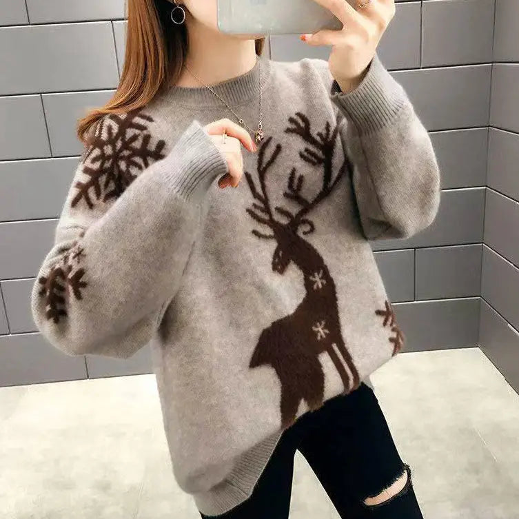 Womens christmas sweater with reindeer and snowflake design, oversized fit, ribbed cuffs