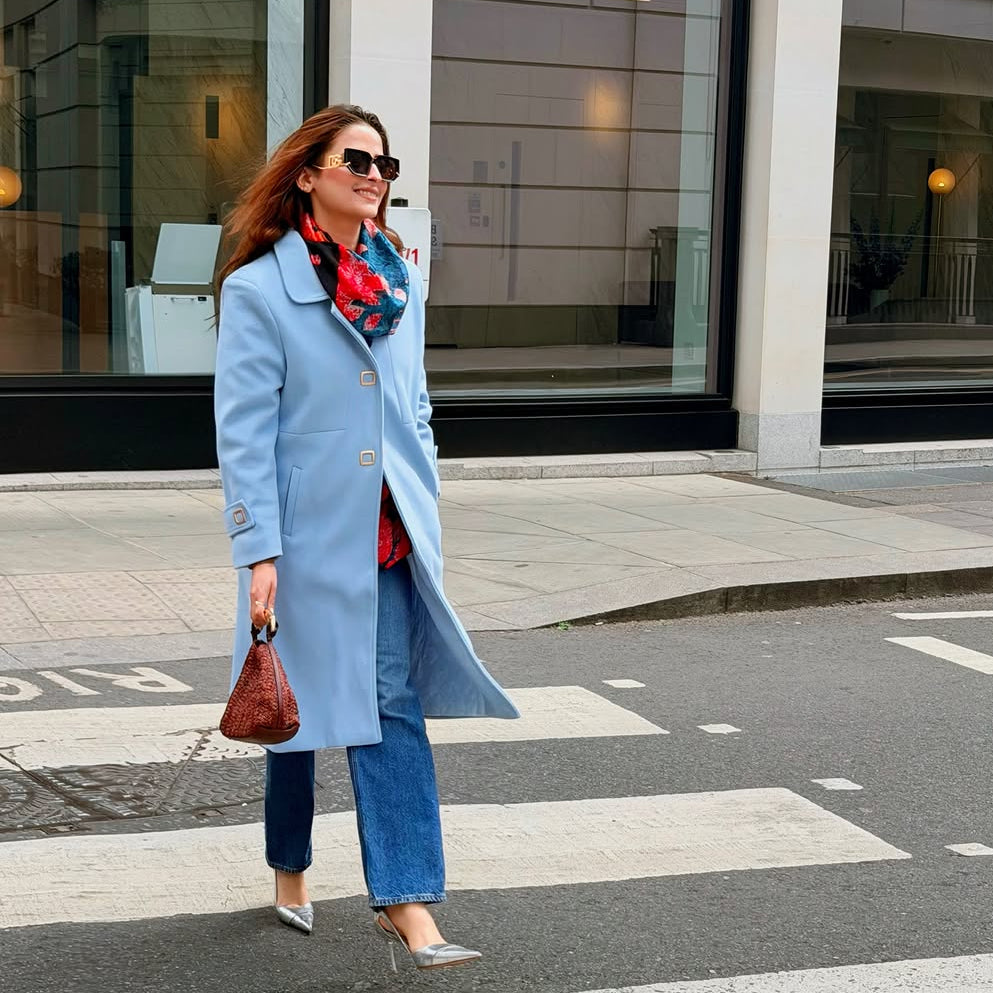 Long single breasted coat for women with waist seam and flared A-line shape