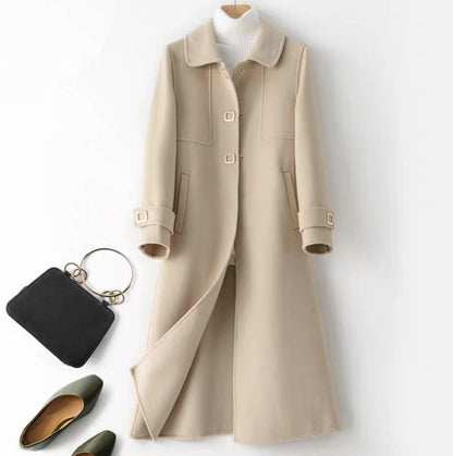 Long single breasted coat for women with waist seam and flared A-line shape