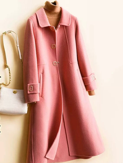 Long single breasted coat for women with waist seam and flared A-line shape