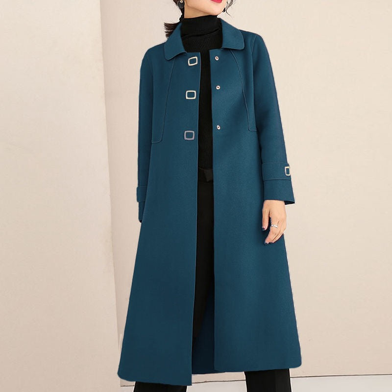 Long single breasted coat for women with waist seam and flared A-line shape