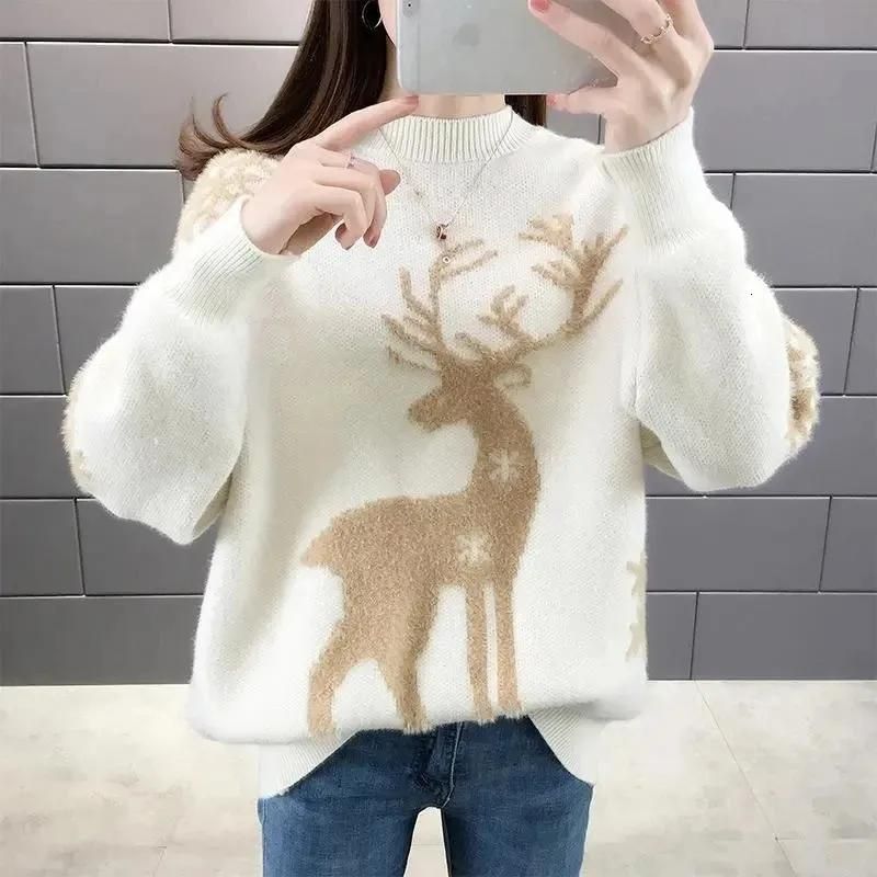 Womens christmas sweater with reindeer and snowflake design, oversized fit, ribbed cuffs