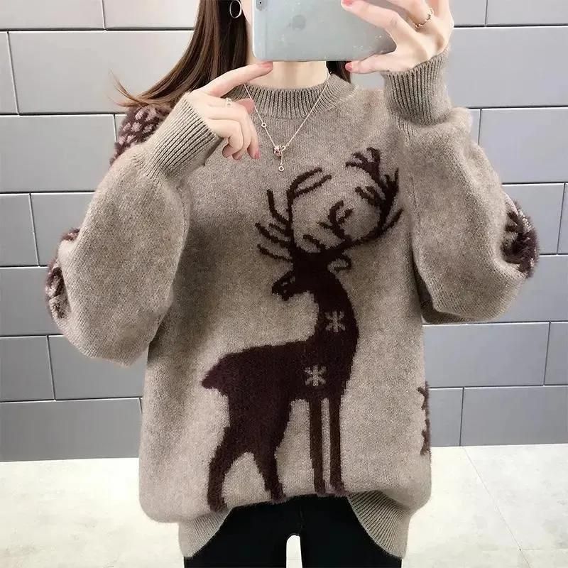 Womens christmas sweater with reindeer and snowflake design, oversized fit, ribbed cuffs