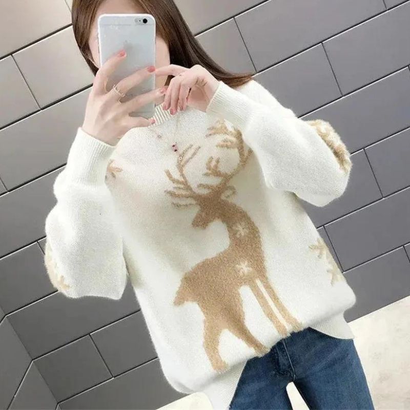 Womens christmas sweater with reindeer and snowflake design, oversized fit, ribbed cuffs