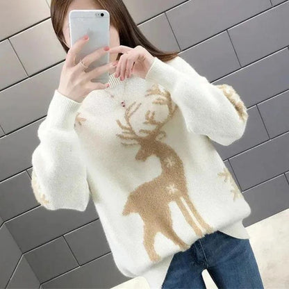 Womens christmas sweater with reindeer and snowflake design, oversized fit, ribbed cuffs