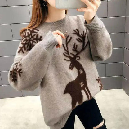 Womens christmas sweater with reindeer and snowflake design, oversized fit, ribbed cuffs