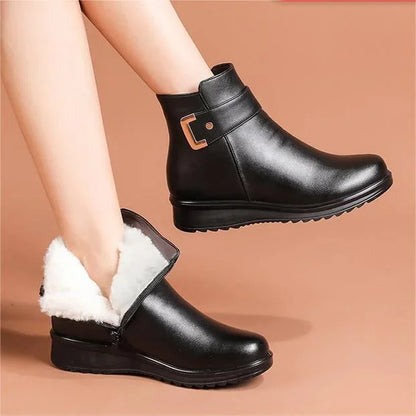 Women's winter boots with a side zip and low wedge heel