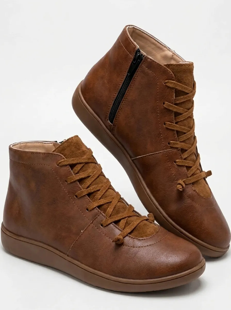Chelsea boots for women with side zip and lace up front, flat sole