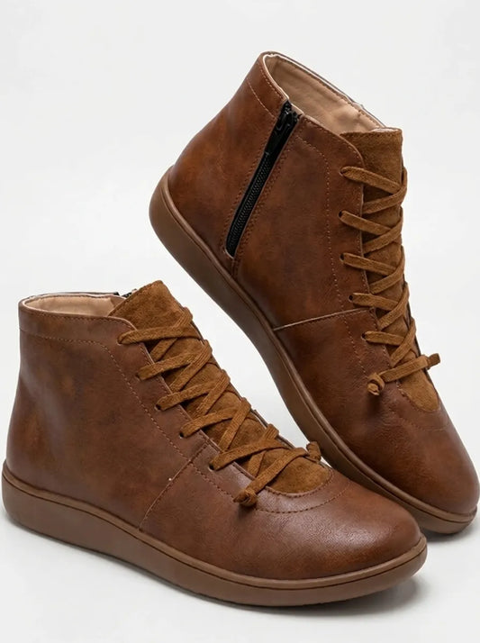 Chelsea boots for women with side zip and lace up front, flat sole