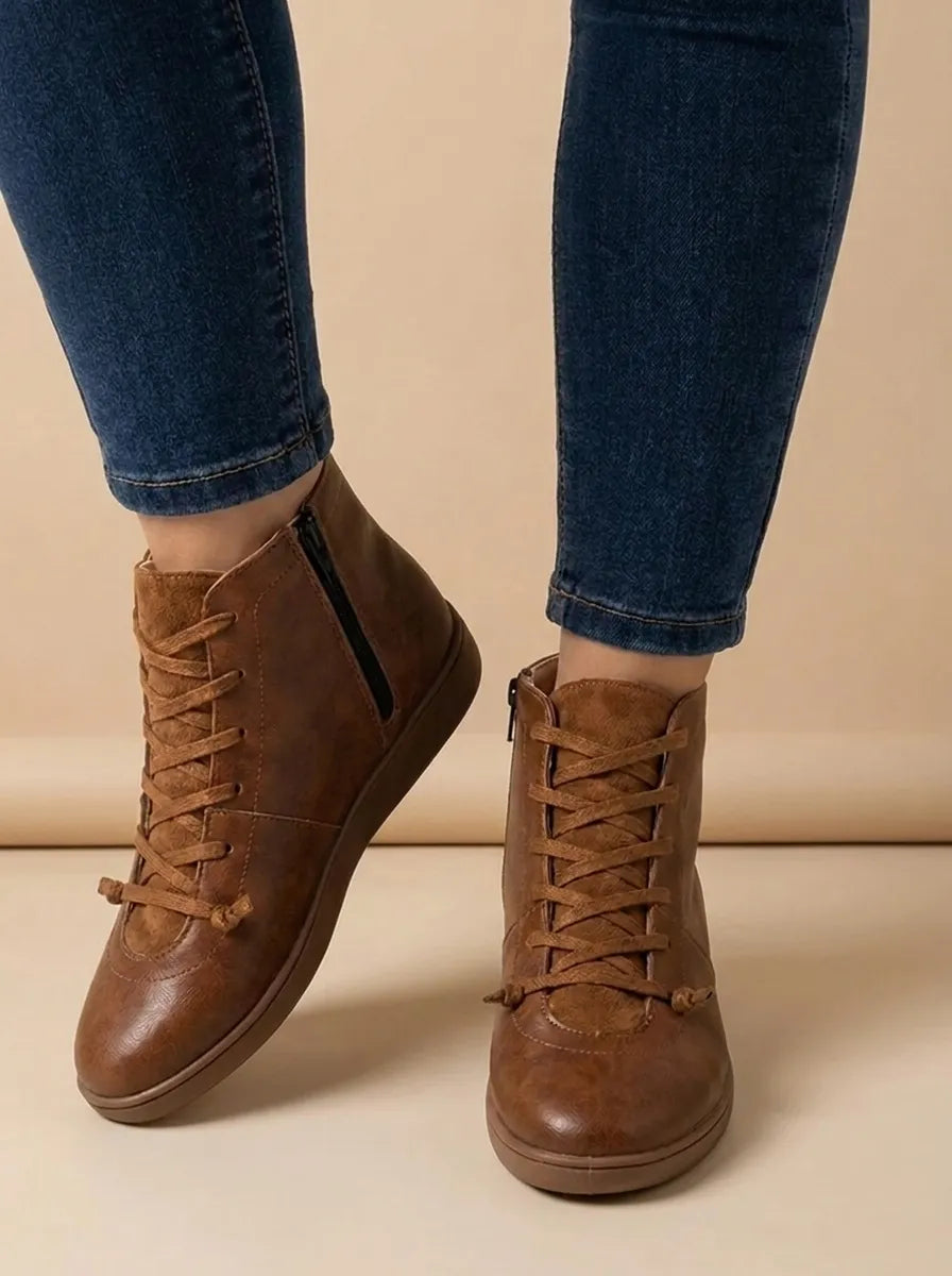 Chelsea boots for women with side zip and lace up front, flat sole